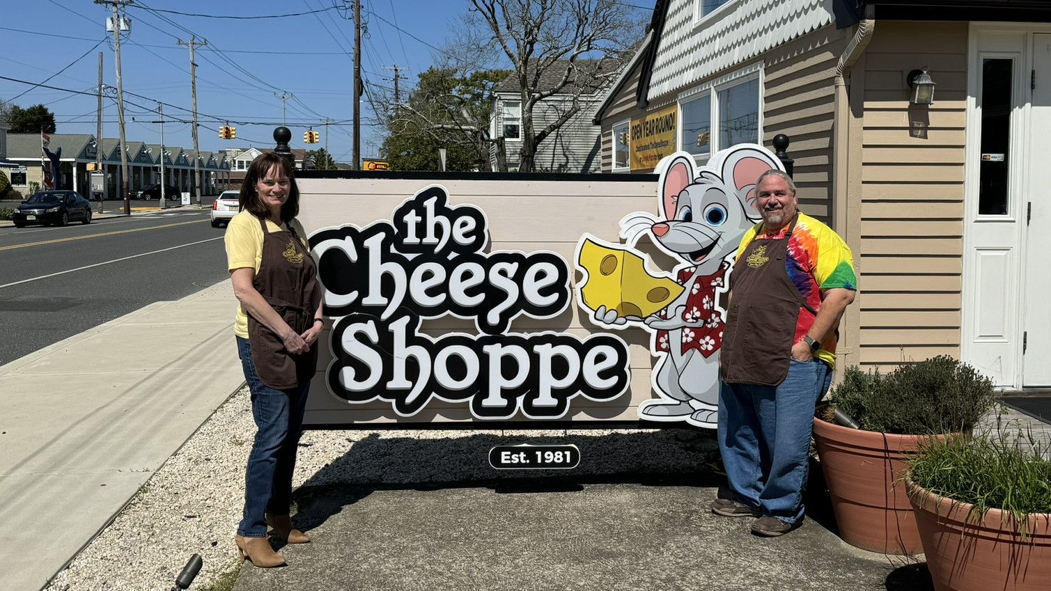 Jaime & Angela by the Shoppe Sign
